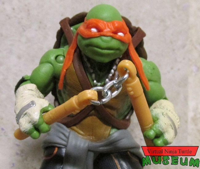 basic Michelangelo with Combat Warrior Michelangelo's nunchucks