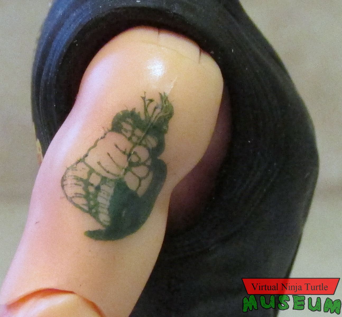 John Kreese's tattoo